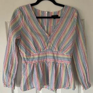 Long sleeve rainbow peplum top from JCrew size 8 in great condition!